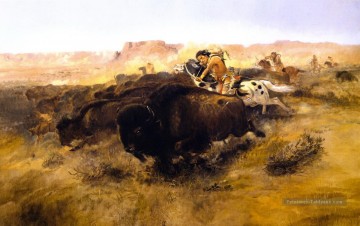 la chasse au bison 1895 Charles Marion Russell Peinture à l'huile